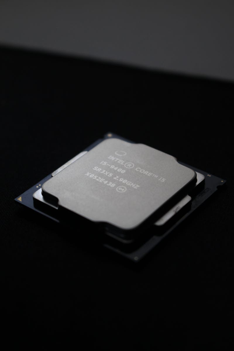 Detailed close-up image of a computer processor chip on a dark background.